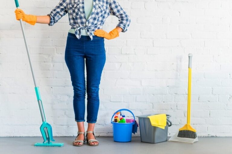 a woman with cleaning equipment, end of tenancy cleaning